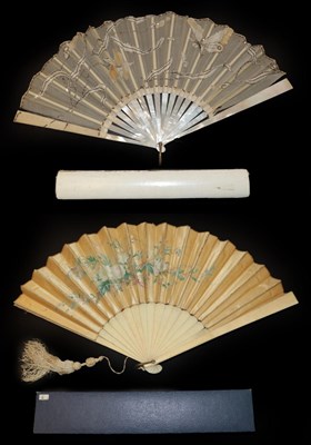 Lot 4056 - A White Mother-of-Pearl Fan, circa 1900, mounted with cream gauze, cream silk being applied and...