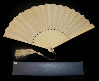 Lot 4056 - A White Mother-of-Pearl Fan, circa 1900, mounted with cream gauze, cream silk being applied and...