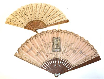 Lot 4060 - An Early 20th Century Cream Gauze Fan embroidered with gold sequins and spangles, mainly in...