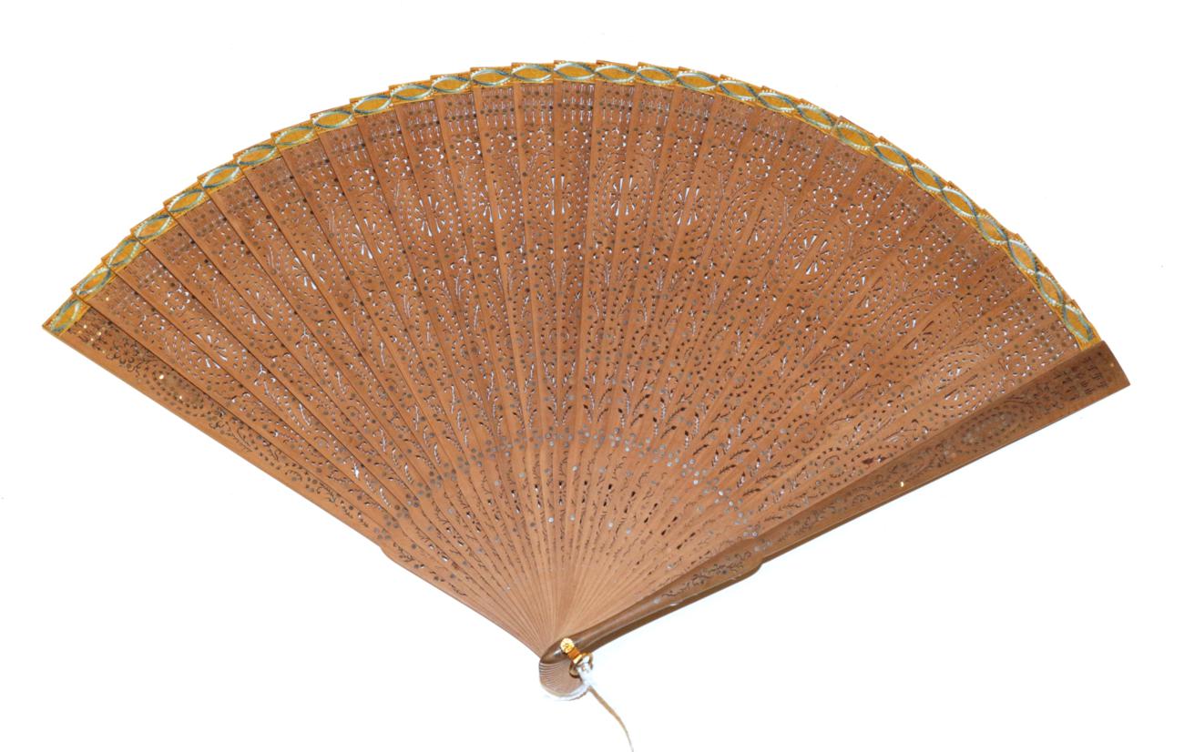 Lot 4072 - A Fine Wood Brisé Fan, circa 1900 but in Regency style, the sticks delicately pierced and...