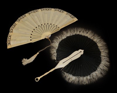 Lot 4074 - Two Very Feminine Fans of differing forms, the first, circa 1900, a bone fan of the type considered