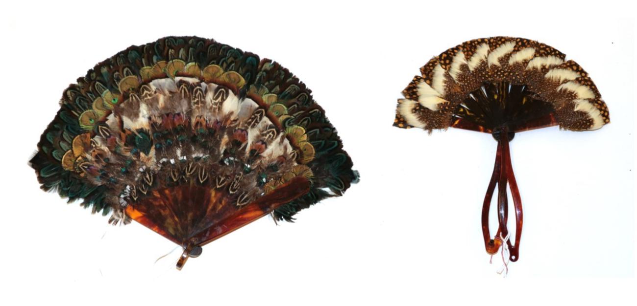 Lot 4078 - A Small Folding Feather Fan, opening to a semi-circle, the guards clipping together to form a fixed
