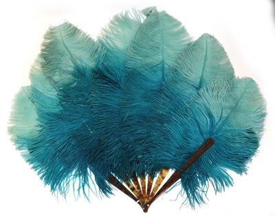 Lot 4081 - A Folding Ostrich Feather Fan, early 20th century, five inner sticks and two guards in a faux...