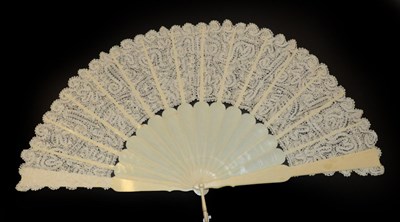 Lot 4100 - A Late 19th Century Ivory Fan, the monture and loop slightly shaped but otherwise plain, the leaf a