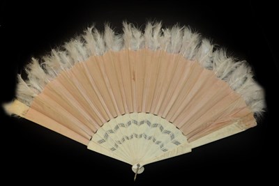 Lot 4101 - A Late 19th Century Pink Mother-of-Pearl Fan, mounted with a lace leaf of Brussels Bobbin...