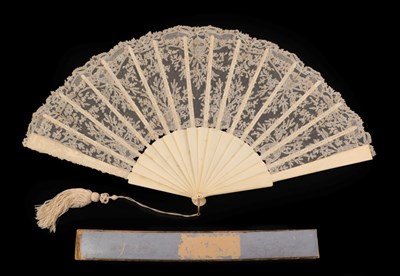 Lot 4107 - A Large Lace Fan, circa 1890's, the monture plain with chamfered edges to the guards. The light and