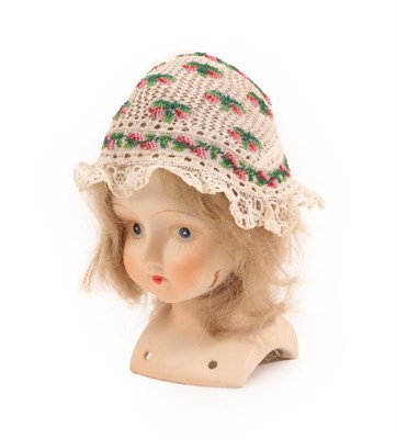 Lot 4135 - Two Tiny Early 19th Century Knitted Child's or Doll's Caps or Bonnets embellished with beads,...