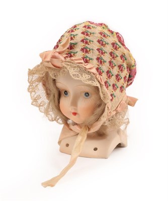 Lot 4137 - A Circa 1820's Knitted Silk Beaded Child's or Doll's Cap or Bonnet edged with blonde lace, a...