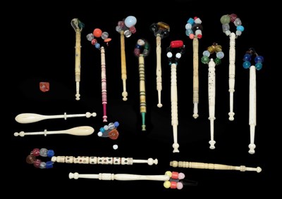 Lot 4144 - Fifteen Bone Lace Bobbins, some with spangles, with differing degrees of carving and detail (15)