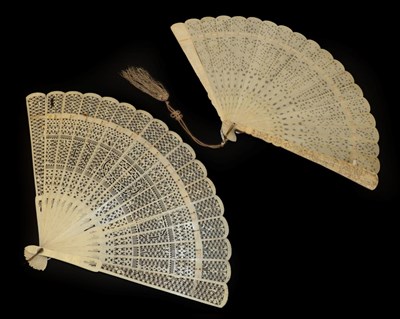Lot 4226 - A Large Qing Dynasty Chinese Carved Ivory Brisé Fan, circa 1850, the two guards deeply carved with