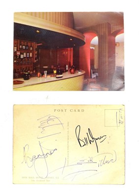 Lot 5056 - Rolling Stones Signatures a postcard hand signed by four of the Rolling Stones: Mick Jagger,...