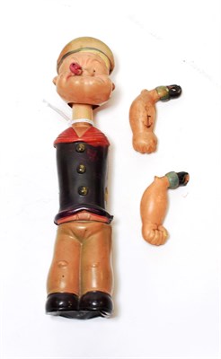 Lot 5255 - Japanese Celluloid Popeye with clockwork motor 8 1/2'', 22cm (G, some damage to celluloid, arms...