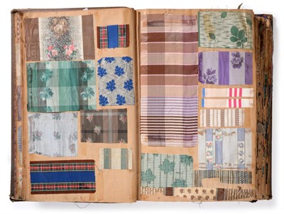 Lot 2077 - French Fabric Sample Book, circa 1859-60  Enclosing printed and woven cottons, silks, brocades,...