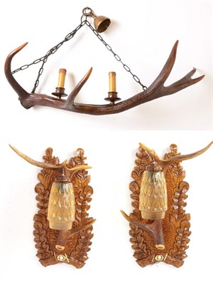 Lot 26 - Antler Furniture: A Pair of Carved Austro-German Wall Lights, circa late 20th century, a pair...