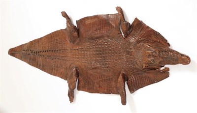 Lot 45 - Taxidermy: A Late Victorian Crocodile Skin (Crocodylus niloticus), circa 1890-1900, a full flat...