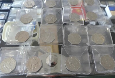 Lot 2044 - Four Boxes of Base Decimal Commemoratives £2 and 50p pieces and a box of 10p Coins. along with...
