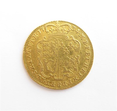 Lot 2052 - George II Guinea 1734 Second Young Laur. Head F+ S3674