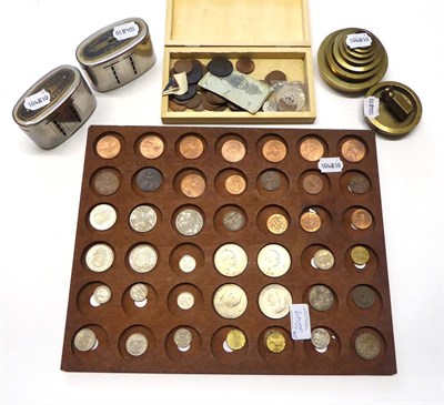 Lot 2249 - Two Martins Bank Savings Tins, mixed coins, seven brass sovereign scales weights, 19th century