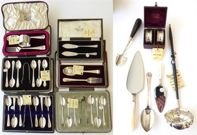 Lot 14 - A Quantity of Silver Flatware, including: three cased sets of six silver teaspoons with sugar-tongs