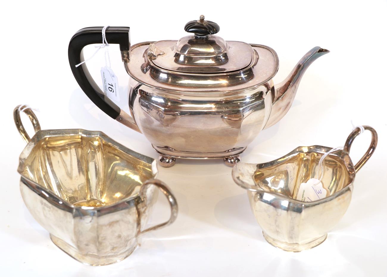 Lot 16 - A George V Silver Teapot and a Similar Cream-Jug and Sugar-Bowl, The Teapot, by Henry Atkin,...