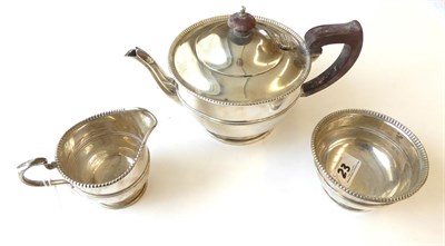 Lot 23 - A Three-Piece George V Silver Tea-Service, by Adie Brothers, Birmingham, 1932 and 1935, each...