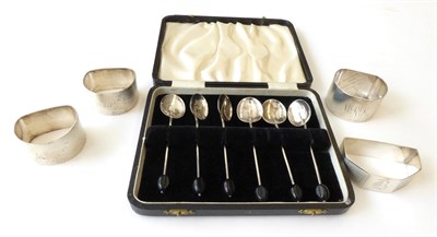Lot 24 - A Group of Silver, including: four various silver napkin-rings, variously engraved and a set of six