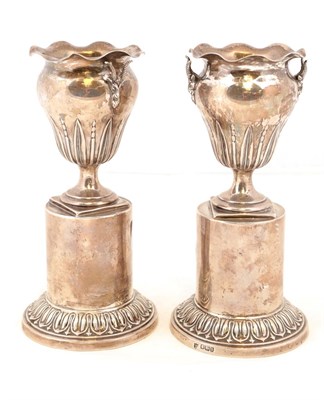 Lot 33 - A Pair of Edward VII Silver Vases on Stands, by Thomas Bradbury and Sons, Sheffield, 1903, the...