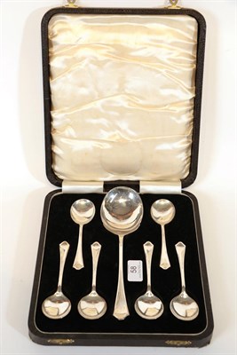 Lot 58 - A Cased Set of Six George VI silver spoons and a Serving Spoon En Suite, by Barker Brothers...