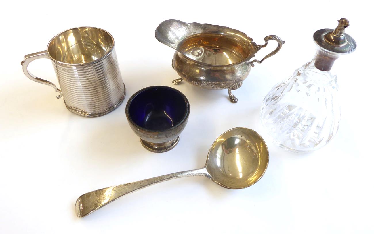 Lot 72 - A Collection of Silver, including: a sauceboat on three pad feet and with leaf-capped handle,...