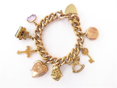 Lot 109 - A Charm Bracelet, each link stamped '9C', hung with assorted seals and charms including a...