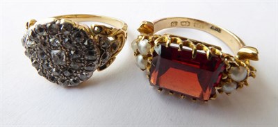 Lot 139 - A Diamond Cluster Ring, stamped '18CT', finger size L1/2; and An 18 Carat Gold Garnet and Split...