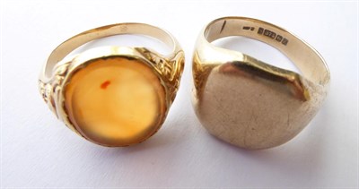 Lot 140 - A 9 Carat Gold Signet Ring, finger size Q; and Another Hardstone Signet Ring, unmarked, finger size