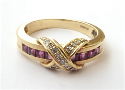 Lot 143 - A 14 Carat Gold Ruby and Diamond Ring, finger size P1/2