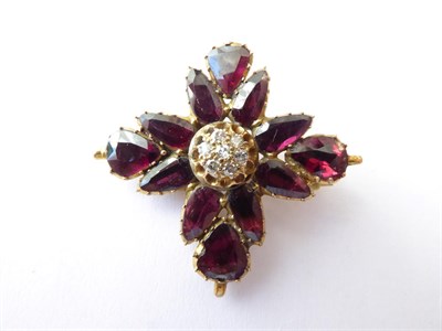 Lot 154 - A Victorian Garnet and Diamond Brooch, measures 3.3cm by 3.1cm