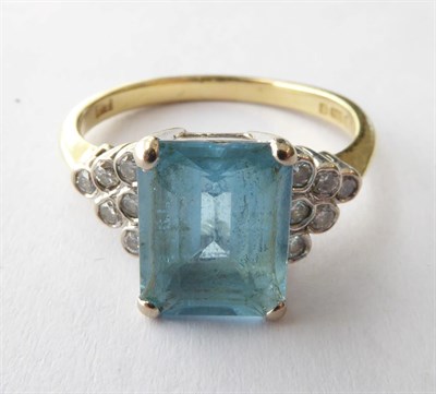 Lot 170 - An 18 Carat Gold Topaz and Diamond Ring, finger size N1/2
