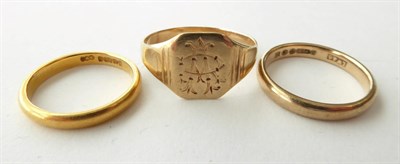 Lot 174 - A 22 Carat Gold Band Ring, finger size I; A 9 Carat Gold Band Ring, finger size M; and A Signet...