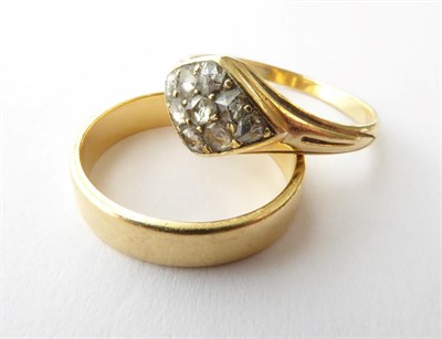 Lot 184 - An 18 Carat Gold Band Ring, finger size K; and A Diamond Cluster Ring, finger size M1/2