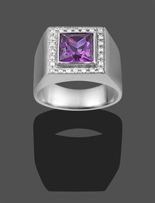 Lot 2006 - A Synthetic Sapphire and Diamond Ring, the scissor cut synthetic sapphire simulating alexandrite in