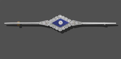 Lot 2011 - A Lapis Lazuli and Diamond Brooch, a rhombus-shaped lapis lazuli plaque with an old cut diamond...
