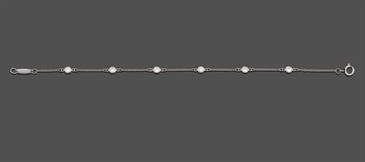 Lot 2018 - A Platinum Diamond Bracelet, by Tiffany & Co., six round brilliant cut diamonds spaced evenly along