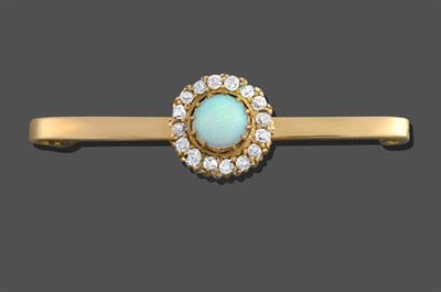 Lot 2027 - An Opal and Diamond Cluster Bar Brooch, the round cabochon opal within a border of old cut...