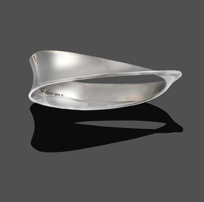 Lot 2059 - A 'Mobius' Bangle, by Georg Jensen, of asymmetric polished form, numbered 206, inner...