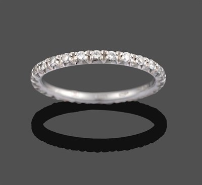 Lot 2062 - A Diamond Eternity Ring, the old cut diamonds in white claw settings, total estimated diamond...