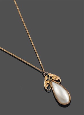 Lot 2087 - An Arts & Crafts Mother-of-Pearl Pendant on A 9 Carat Gold Chain, a yellow leaf motif surmounts...
