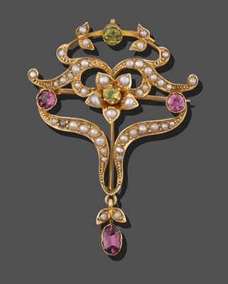 Lot 2092 - An Edwardian Peridot, Pink Tourmaline and Seed Pearl Brooch/Pendant, a central cluster formed...