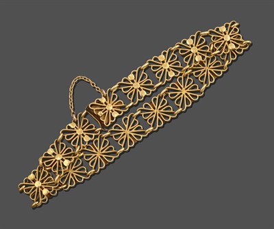 Lot 2094 - A Fancy Link Bracelet, formed of sixteen yellow floral motif links, length 19.5cm see illustration