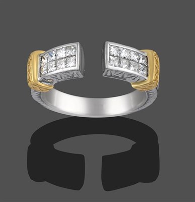 Lot 2106 - A Diamond Cuff Ring, a white textured band terminates to four pairs of princess cut diamond...