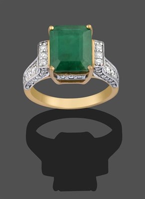 Lot 2125 - A 9 Carat Gold Emerald and Diamond Ring, the emerald-cut emerald in a yellow four claw setting,...