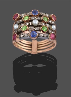 Lot 2142 - A Multi-Gemstone Stacking Ring, formed of five bands each set with alternating round cut...