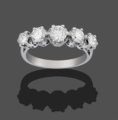 Lot 2148 - A Diamond Five Stone Ring, the graduated round brilliant cut diamonds in white claw settings,...